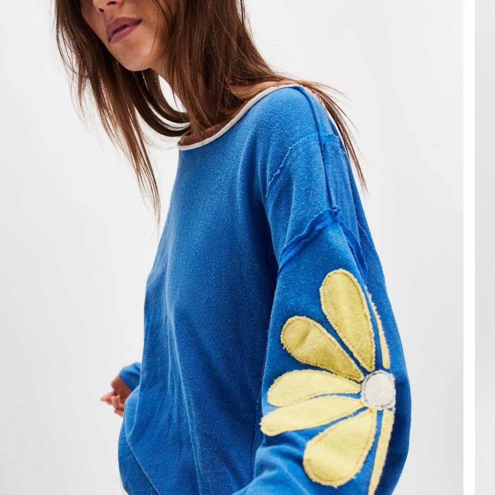 We the Free Your a Star Tee Oversized with Yellow Flower Design.